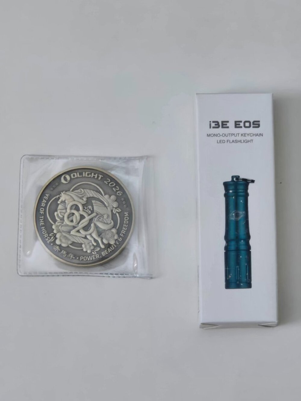 Olight 2026 Year Of The Horse Challenge Coin + i3E EOS 19th Anniv Edition Light